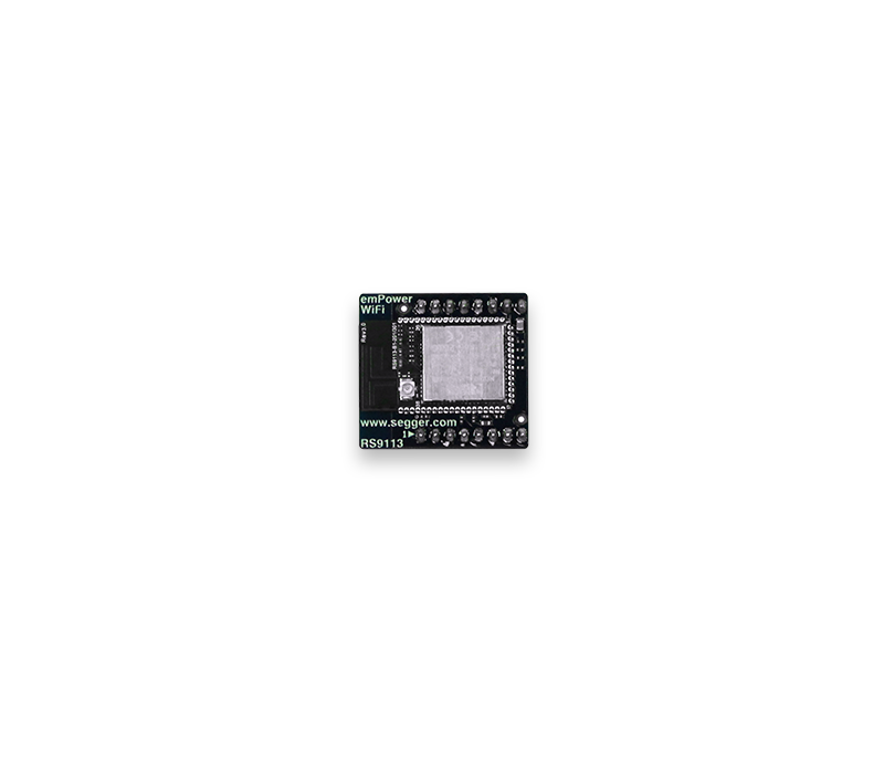 A small electronic circuit board with a rectangular chip at the center and various soldered connections around the edges. It features the text "emPower WiFi" and the website "www.segger.com" along with the model number "RS9113." The background is plain.