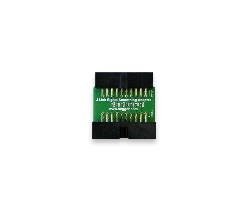 Image of a J-Link Signal Smoothing Adapter, which is a small green circuit board with metal connectors on each side. It features printed text indicating its name and a website, with multiple pins visible for connectivity. The board is placed on a plain white background.